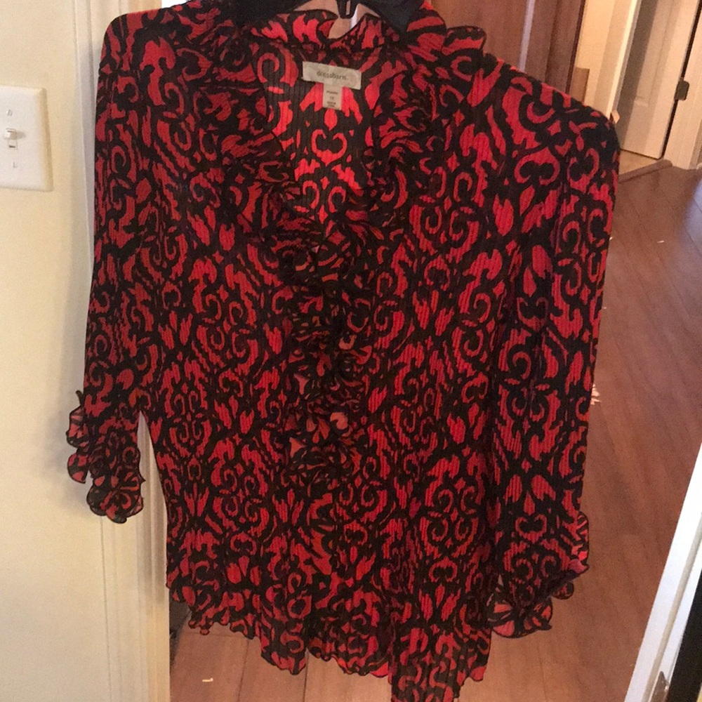 Ribbed, ruffly, sheer red blouse